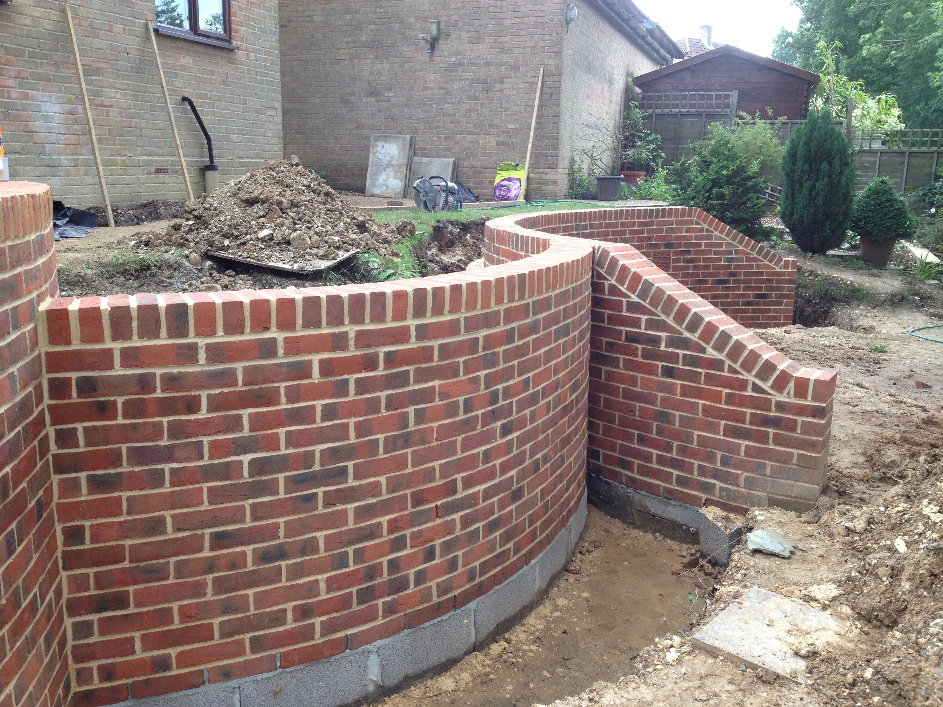 how to build a curved brick wall step by step